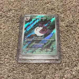 Pokemon Card with Holographic Blue and Silver Design